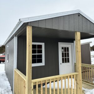 C CABIN STANDARD FEATURES. Low pitched gable roof with 92" interior wall height One (1) 36"x78" 9-Lite door Three (3) 2'x3' windows 2"x6" pressure-treated floor joists spaced 16" on center 5/8" tongue-and-groove flooring 6' deep porch full width of building Urethane Siding [Metal Siding Available for additional cost] Truss plates are used on ALL JOINTS for maximum stability 50-year warranty on siding 30 Year Roofing