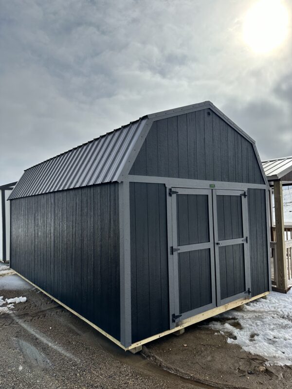 12'x20' LB LOFTED BARN STANDARD FEATURES. Barn Style Roof with 6'6" height under loft All buildings come standard with a 70" wide double door 2"x6" pressure-treated floor joists spaced 16" on center Wall studs 16" on center and double studded (24" on Metal) 5/8" tongue-and-groove flooring Urethane Siding [Metal Siding Available for additional cost] Truss plates are used on ALL JOINTS for maximum stability 50-year warranty on siding 30-year Metal roof