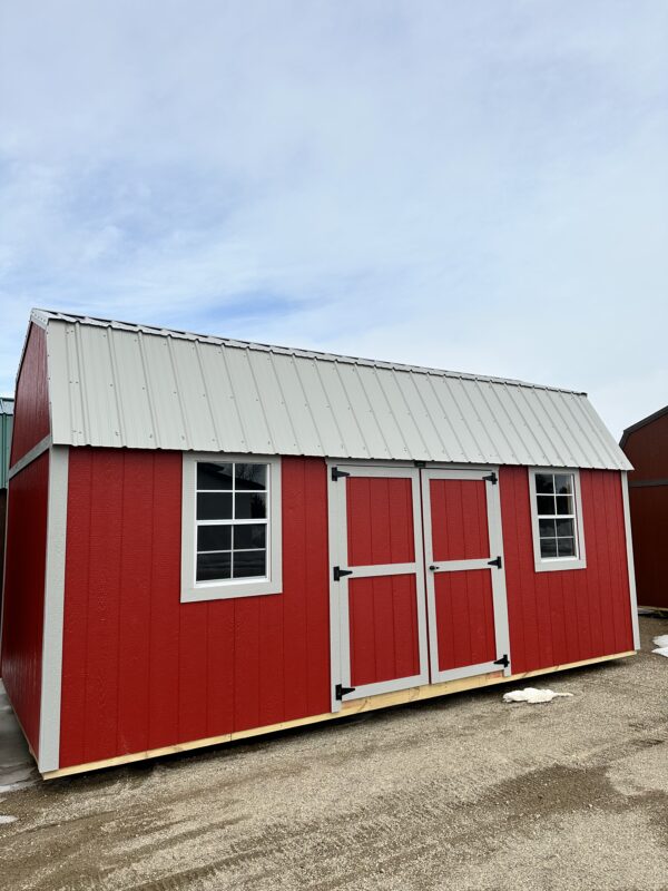 10'x20' SLB SIDE LOFTED BARN STANDARD FEATURES. Barn Style Roof with 6'6" height under loft All buildings come standard with a 70" wide double door 2"x6" pressure-treated floor joists spaced 16" on center Wall studs 16" on center and double studded (24" on Metal) 5/8" tongue-and-groove flooring Urethane Siding [Metal Siding Available for additional cost] Truss plates are used on ALL JOINTS for maximum stability 50-year warranty on siding 30-year Metal roof