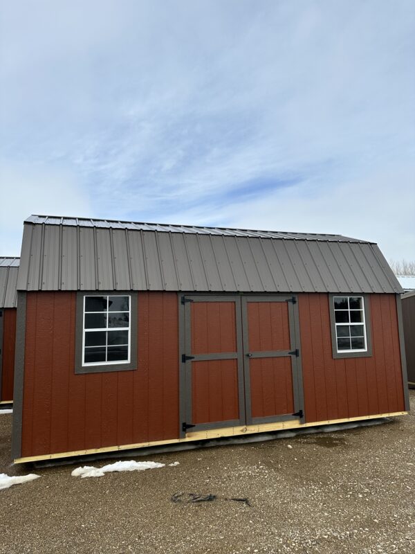 10'x20' SLB SIDE LOFTED BARN STANDARD FEATURES. Barn Style Roof with 6'6" height under loft All buildings come standard with a 70" wide double door 2"x6" pressure-treated floor joists spaced 16" on center Wall studs 16" on center and double studded (24" on Metal) 5/8" tongue-and-groove flooring Urethane Siding [Metal Siding Available for additional cost] Truss plates are used on ALL JOINTS for maximum stability 50-year warranty on siding 30-year Metal roof
